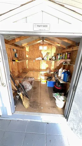 a living room with furniture or couch and a fireplace