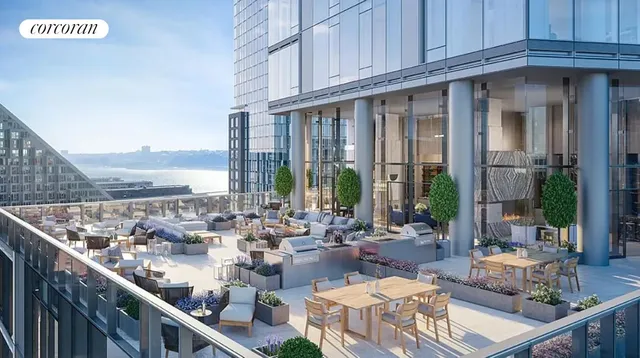 a living room with furniture and large windows