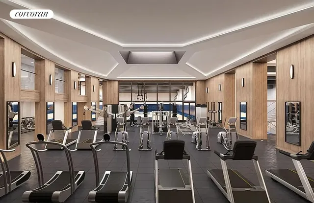 a very nice looking living room with many windows