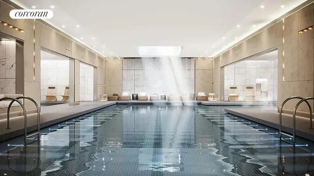 a view of a kitchen with kitchen island a large window a sink and counter space