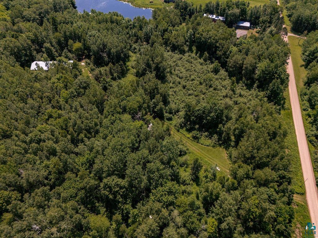 2592 Strandberg Road Barnum, MN 55707 - Photo 40 of 44 Expansive forested property featuring dense tree cover, multiple clearings, and a partial water feature