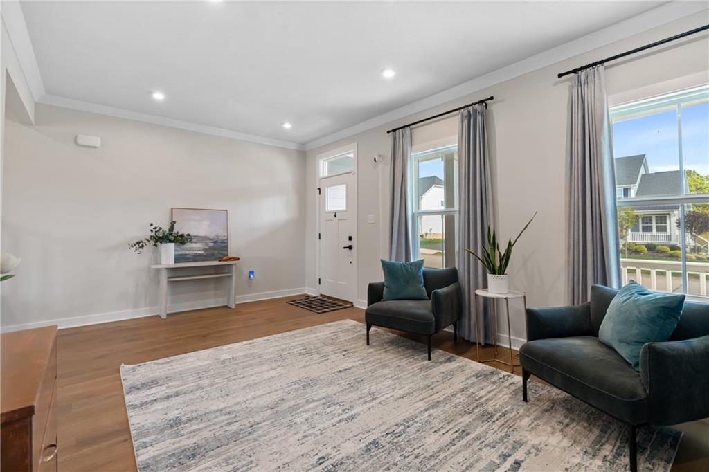 114 Marketplace Avenue Coraopolis, PA 15108 - Photo 11 of 32 a living room with furniture and wooden floor