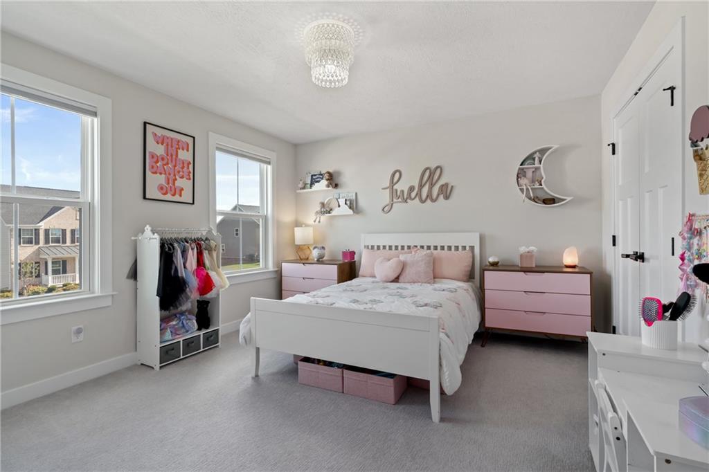 114 Marketplace Avenue Coraopolis, PA 15108 - Photo 21 of 32 a bedroom with a bed and a window