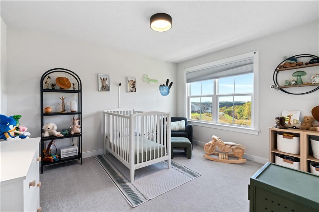 114 Marketplace Avenue Coraopolis, PA 15108 - Photo 22 of 32 a bedroom with furniture and a window