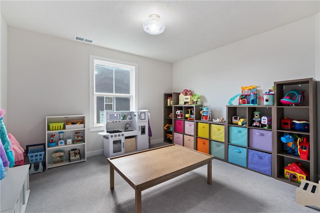 114 Marketplace Avenue Coraopolis, PA 15108 - Photo 24 of 32 a room with furniture and a wooden floor