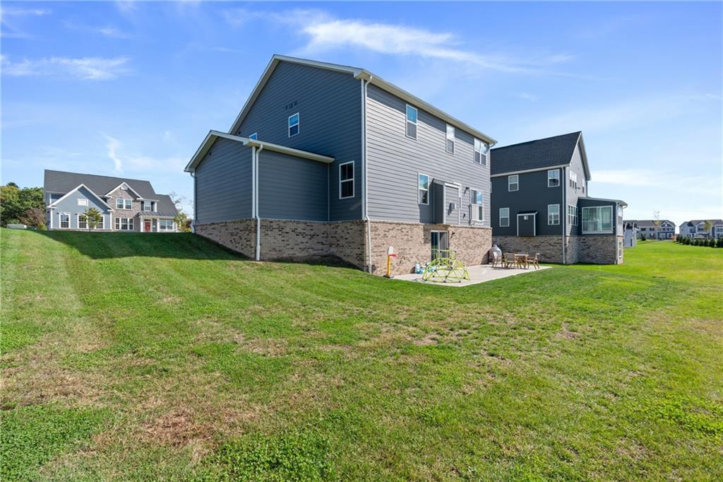 114 Marketplace Avenue Coraopolis, PA 15108 - Photo 27 of 32 a front view of a house with garden