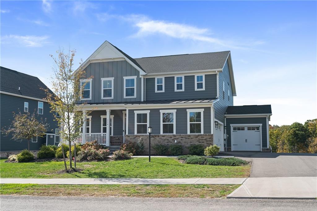 114 Marketplace Avenue Coraopolis, PA 15108 - Photo 29 of 32 a front view of a house with a yard