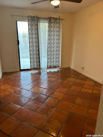 a view of an empty room and window