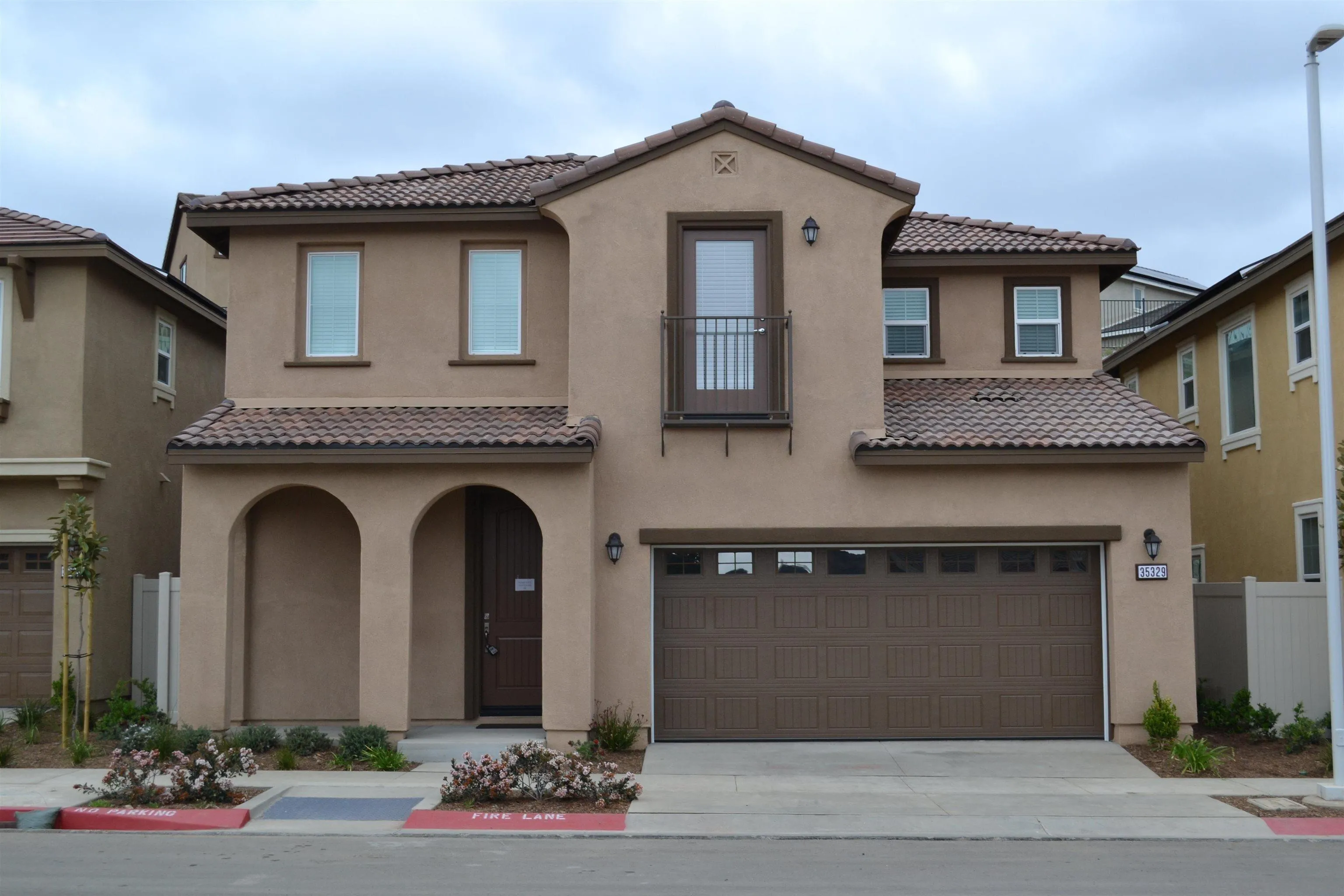 35329 White Camarillo Lane Fallbrook, CA 92028 - Photo 1 of 16 a front view of a house