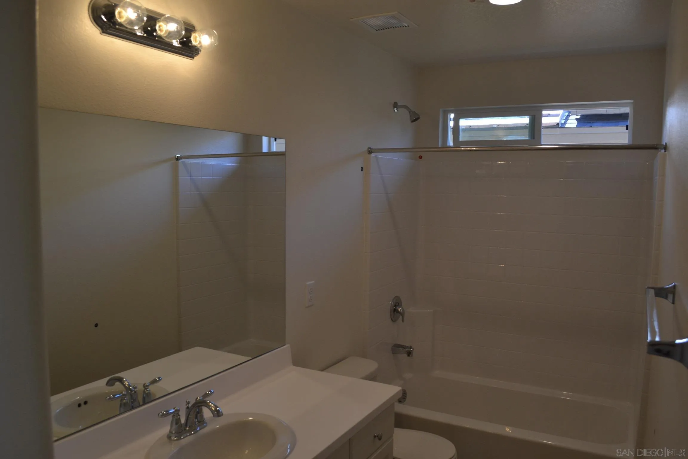 35329 White Camarillo Lane Fallbrook, CA 92028 - Photo 11 of 16 a bathroom with a sink and shower