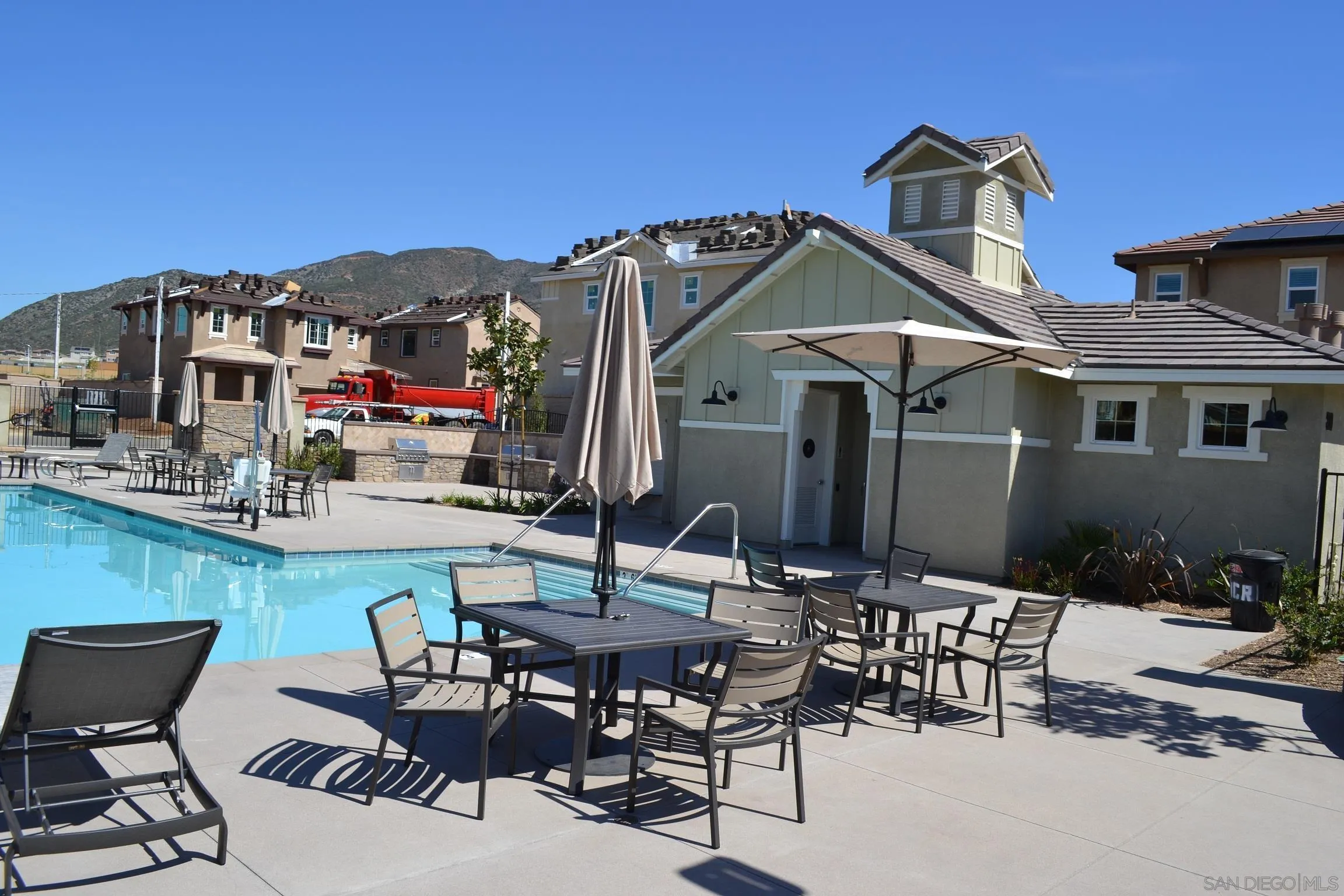 35329 White Camarillo Lane Fallbrook, CA 92028 - Photo 15 of 16 a view of a patio with table and chairs and potted plants