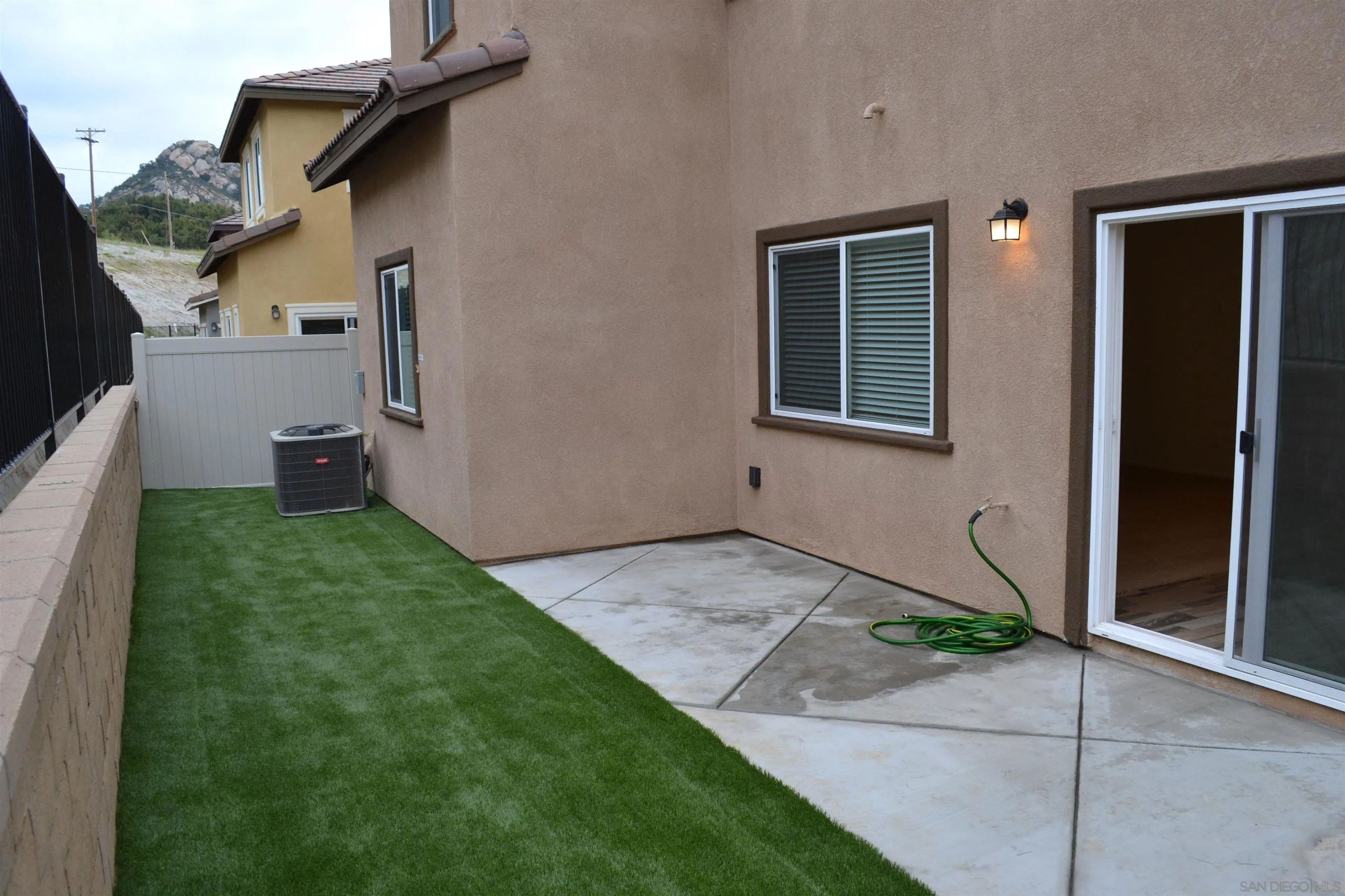 35329 White Camarillo Lane Fallbrook, CA 92028 - Photo 2 of 16 a house view with a backyard space
