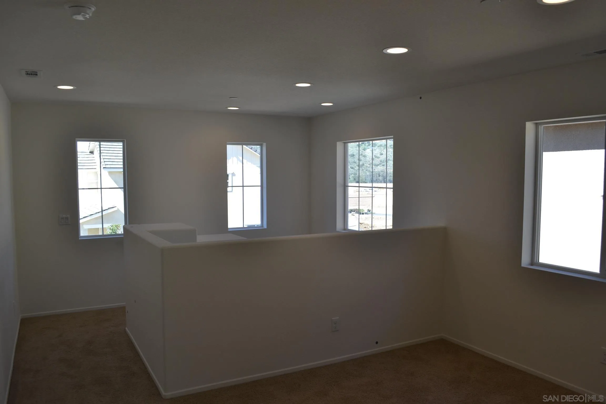 35329 White Camarillo Lane Fallbrook, CA 92028 - Photo 8 of 16 an empty room with windows