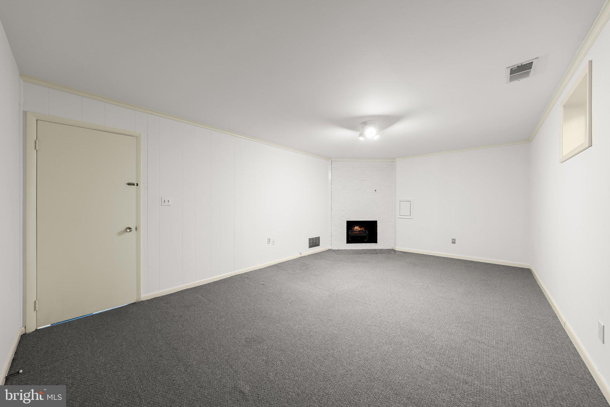 5318 Tuscarawas Road Bethesda, MD 20816 - Photo 27 of 42 Rec room with Fireplace