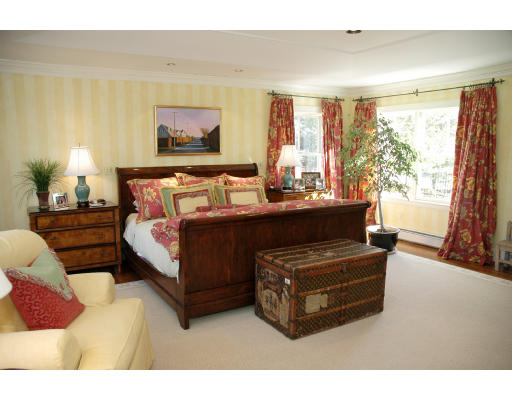 138 Partridge Lane Concord, MA 01742 - Photo 14 of 19 a bedroom with furniture and a large window