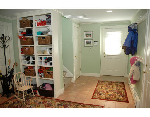 138 Partridge Lane Concord, MA 01742 - Photo 16 of 19 a view of walk in closet with clothes and shoes