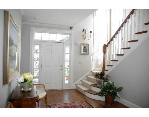 138 Partridge Lane Concord, MA 01742 - Photo 3 of 19 a view of entryway with wooden floor