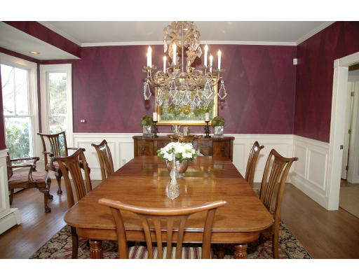 138 Partridge Lane Concord, MA 01742 - Photo 4 of 19 a view of a dining room with furniture a chandelier and wooden floor