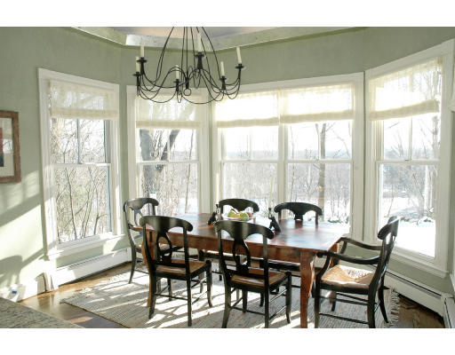 138 Partridge Lane Concord, MA 01742 - Photo 8 of 19 a view of a dining room with furniture window and outside view