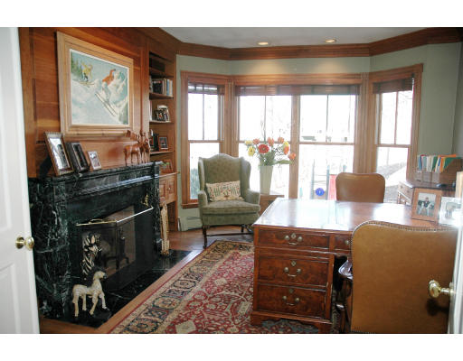 138 Partridge Lane Concord, MA 01742 - Photo 9 of 19 a living room with furniture a large window and flat screen tv