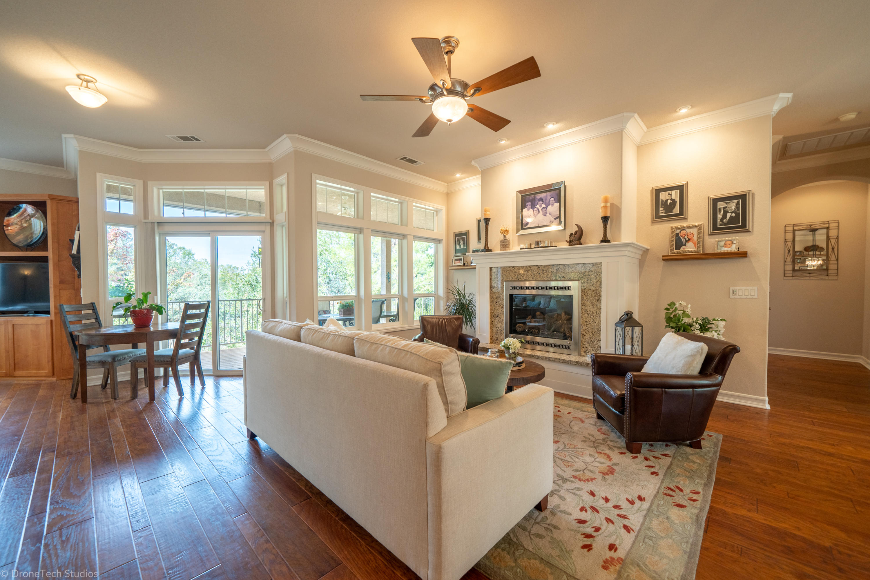 3179 Pinot Path Redding, CA 96001 - Photo 10 of 60 a living room with furniture wooden floor and a fireplace