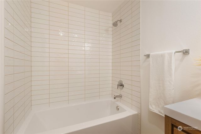 a bathroom with a bathtub