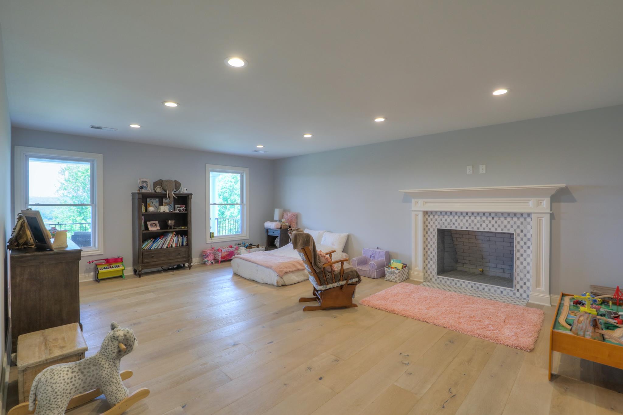 4411 Franklin Road Lebanon, TN 37090 - Photo 21 of 30 a living room with furniture and a fireplace