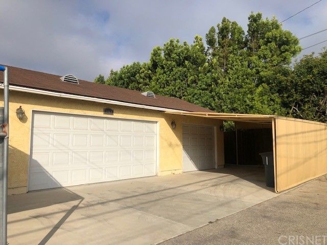 a view of a balcony with an outdoor space