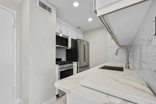 a view of an empty walk in closet