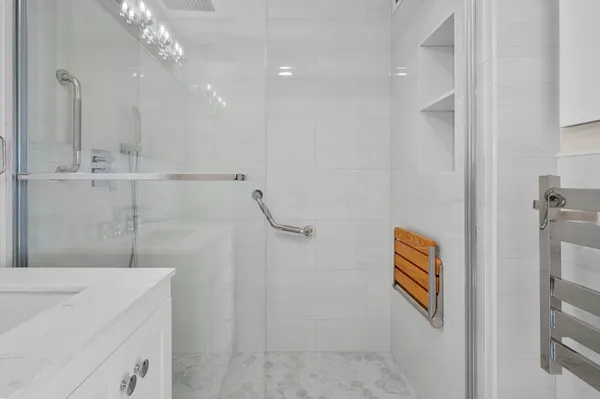 a view of a swimming pool with a lounge chairs