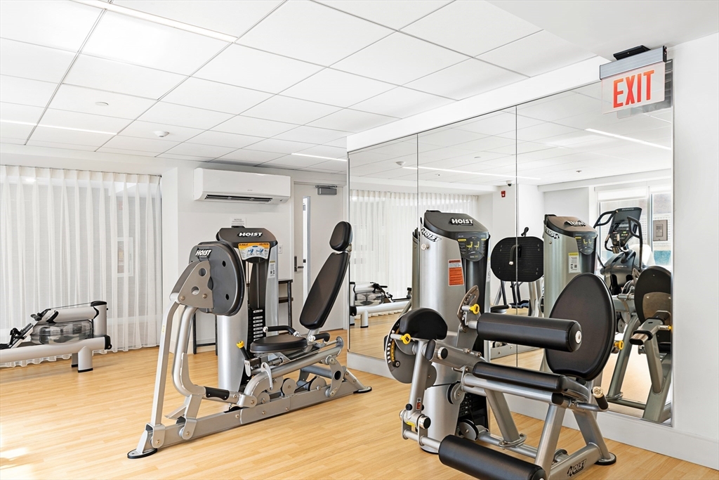 151 Tremont Street, Unit 18M Boston, MA 02111 - Photo 24 of 35 a view of a room with gym equipment