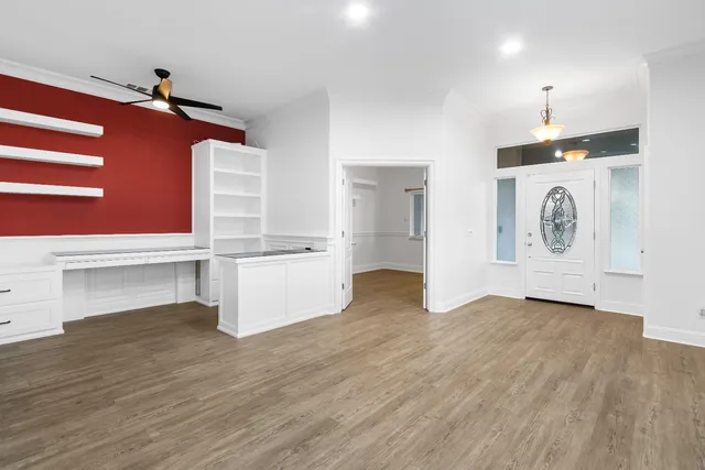 a view of cabinets and wooden floor