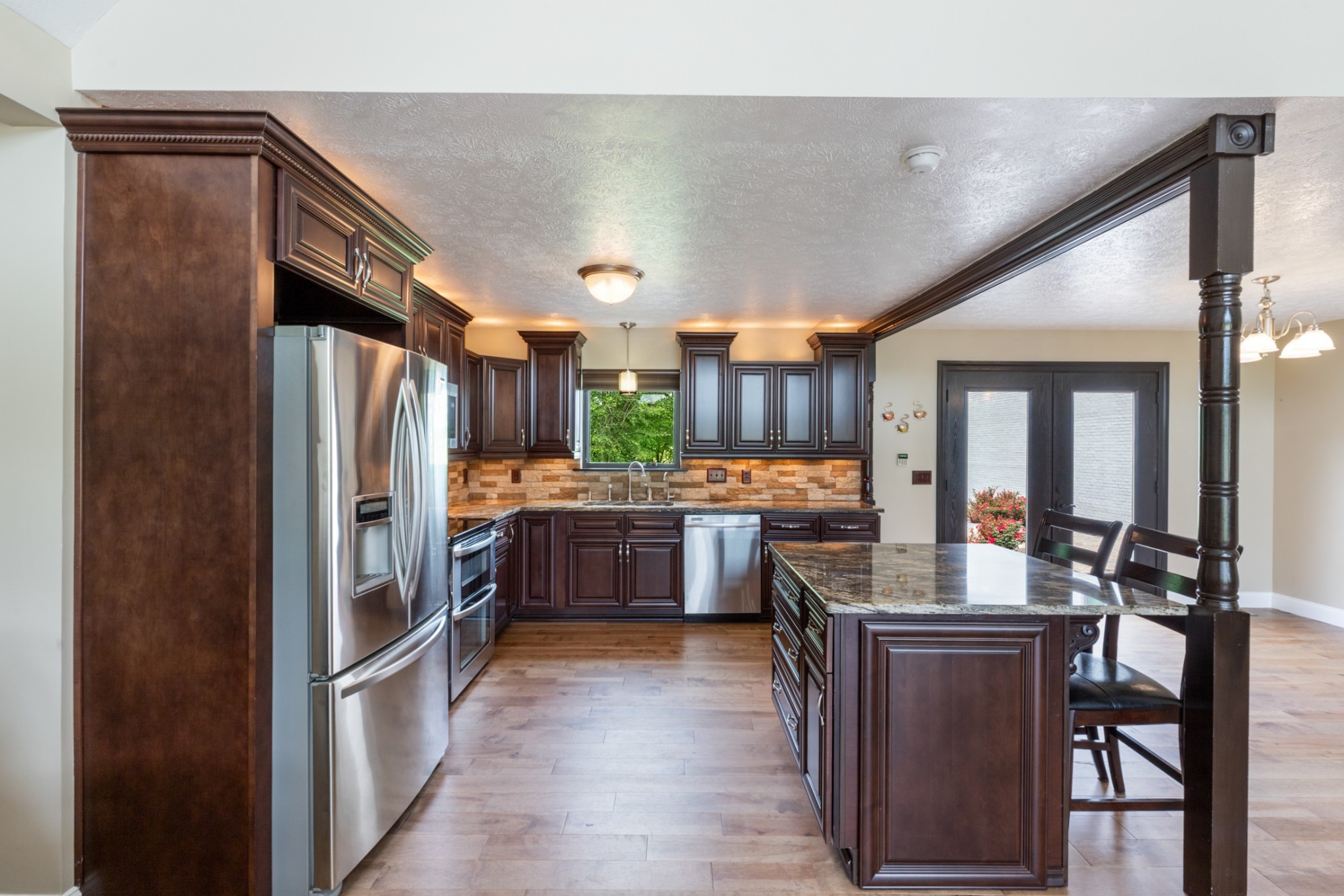 3791 Sylvia Road Dickson, TN 37055 - Photo 19 of 82 a kitchen with stainless steel appliances granite countertop a refrigerator and a stove