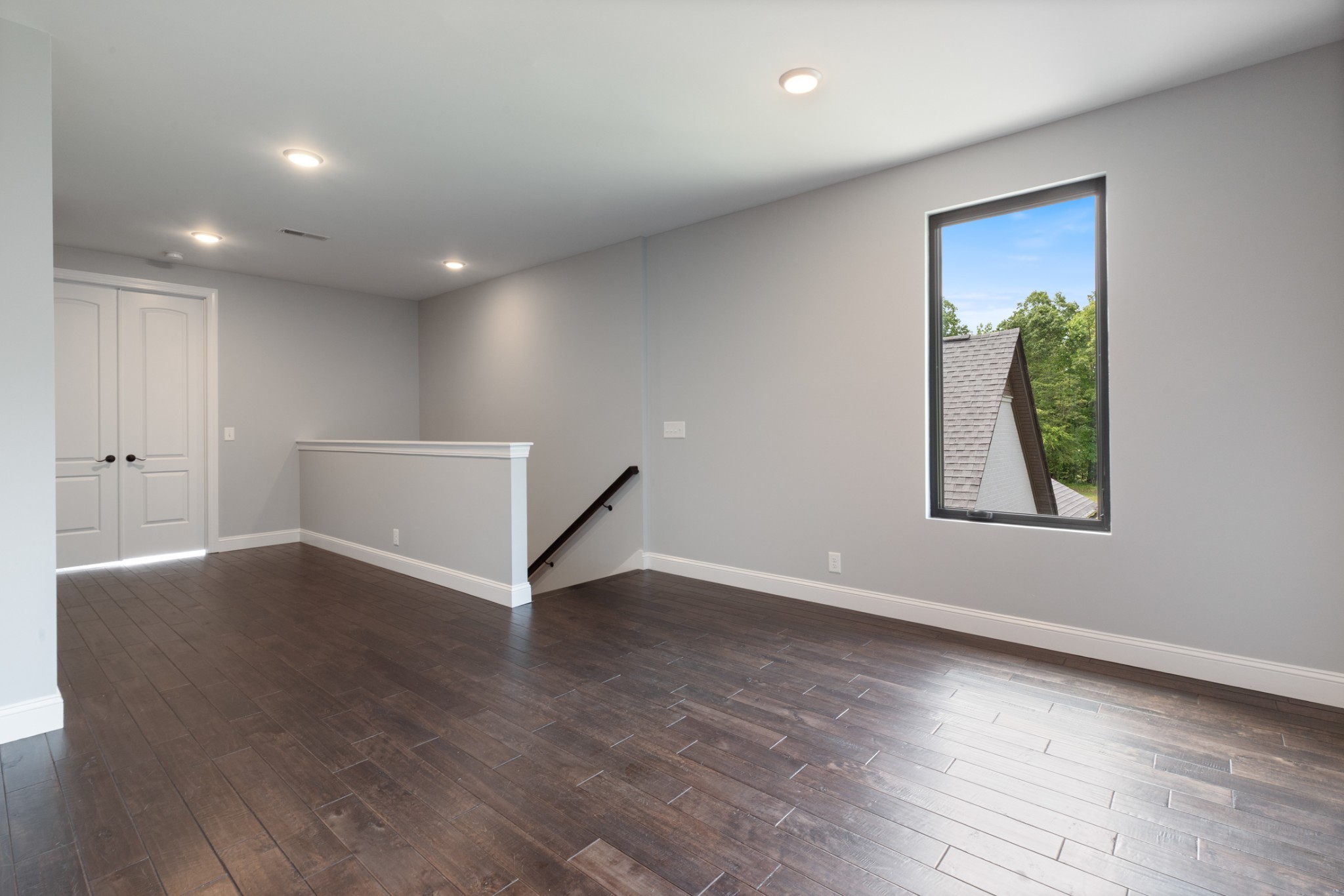 3791 Sylvia Road Dickson, TN 37055 - Photo 36 of 82 an empty room with wooden floor and windows