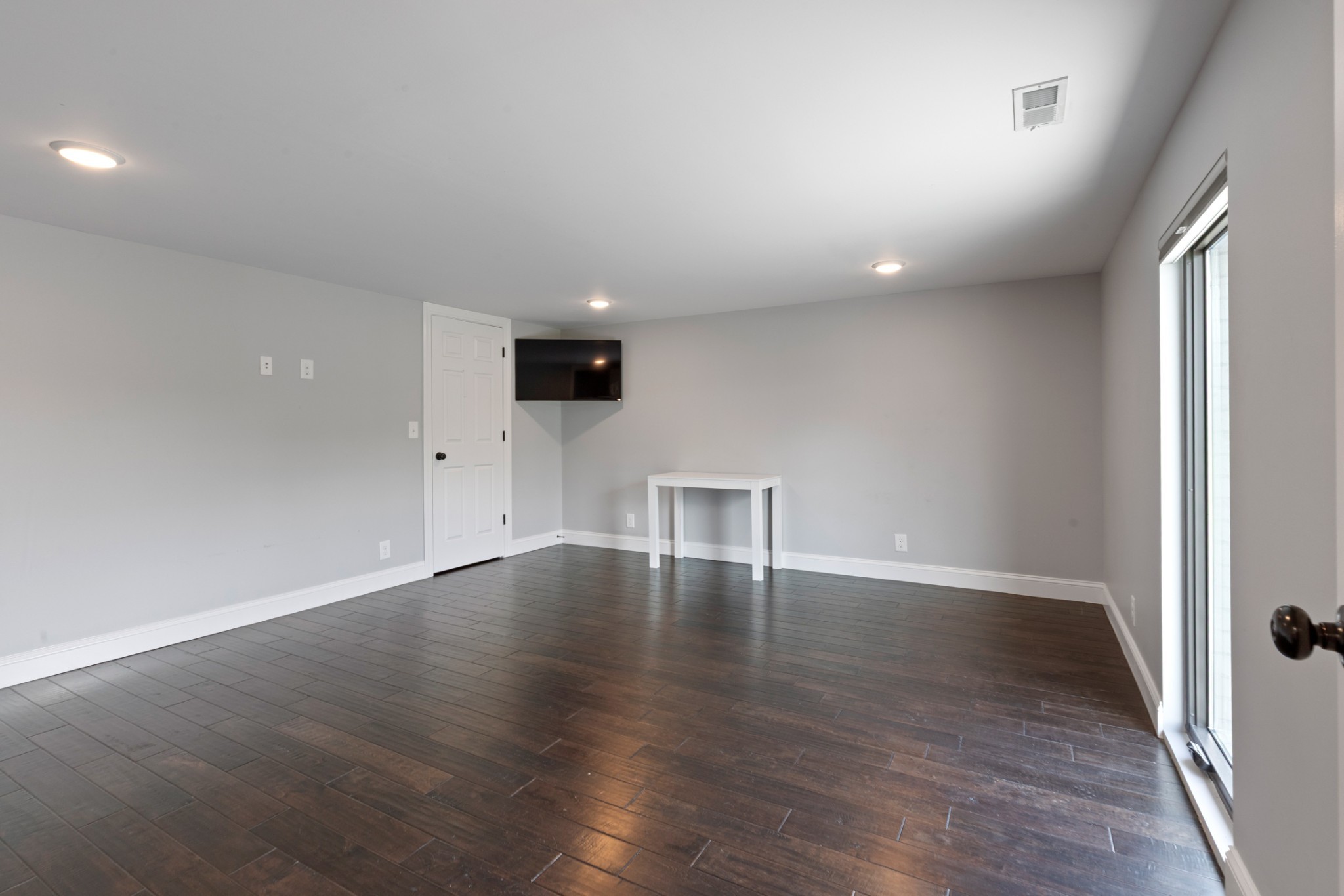 3791 Sylvia Road Dickson, TN 37055 - Photo 46 of 82 an empty room with wooden floor and windows