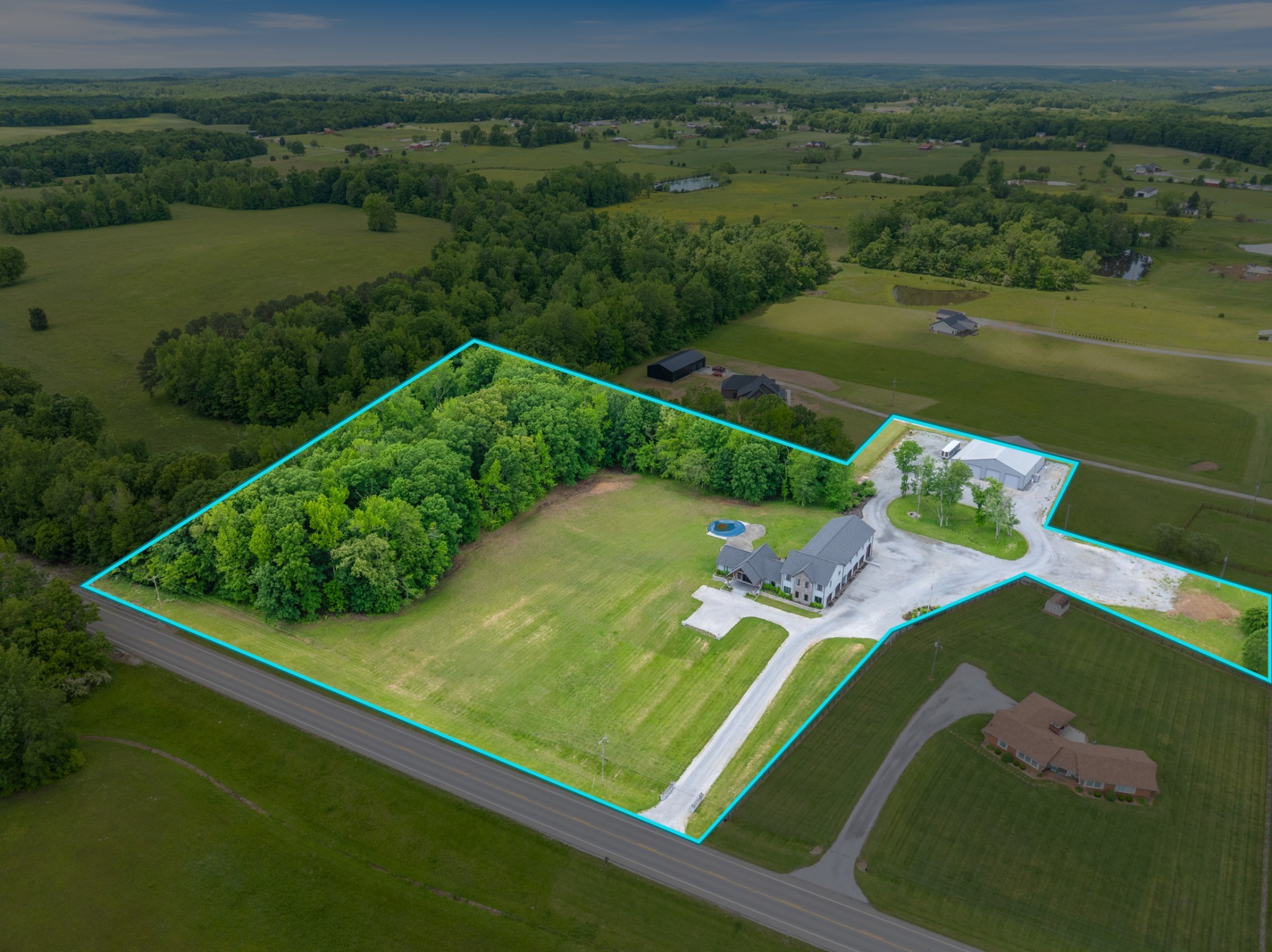 3791 Sylvia Road Dickson, TN 37055 - Photo 10 of 82 an aerial view of a golf course with chairs