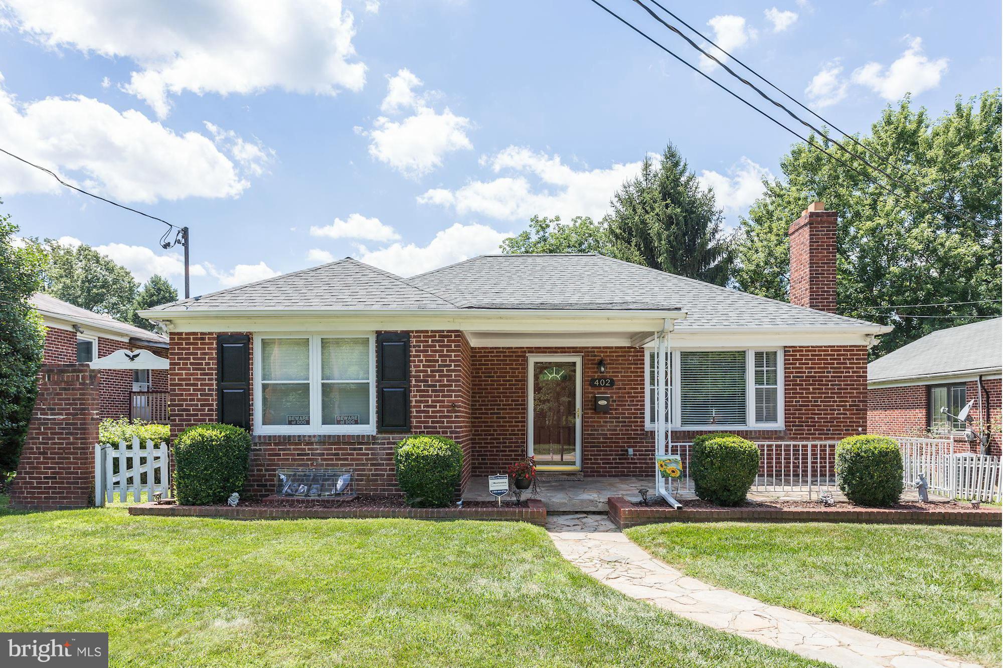402 North Rolling Road Catonsville, MD 21228 - Photo 1 of 17 a view of a house with a yard