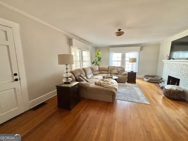 a living room with furniture or couch and a window