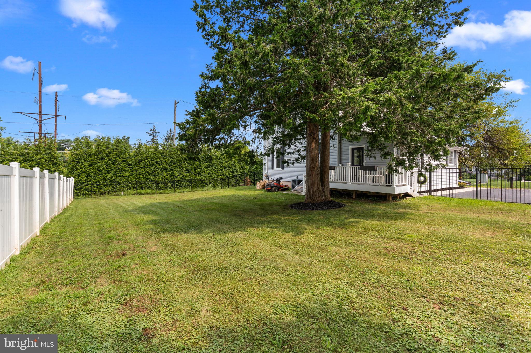 496 East King Road Malvern, PA 19355 - Photo 29 of 35 Spacious yard with lush greenery and shade.