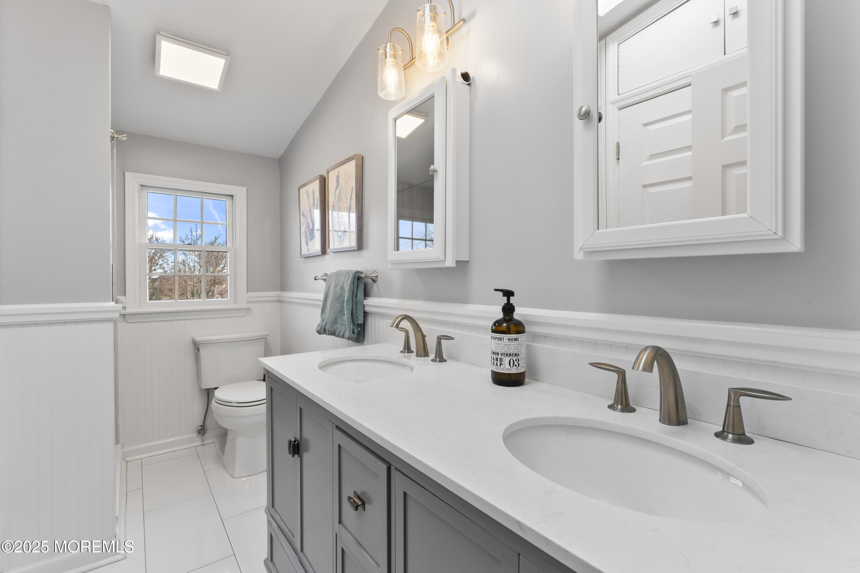 90 River Road Rumson, NJ 07760 - Photo 14 of 32 a bathroom with a sink and a toilet