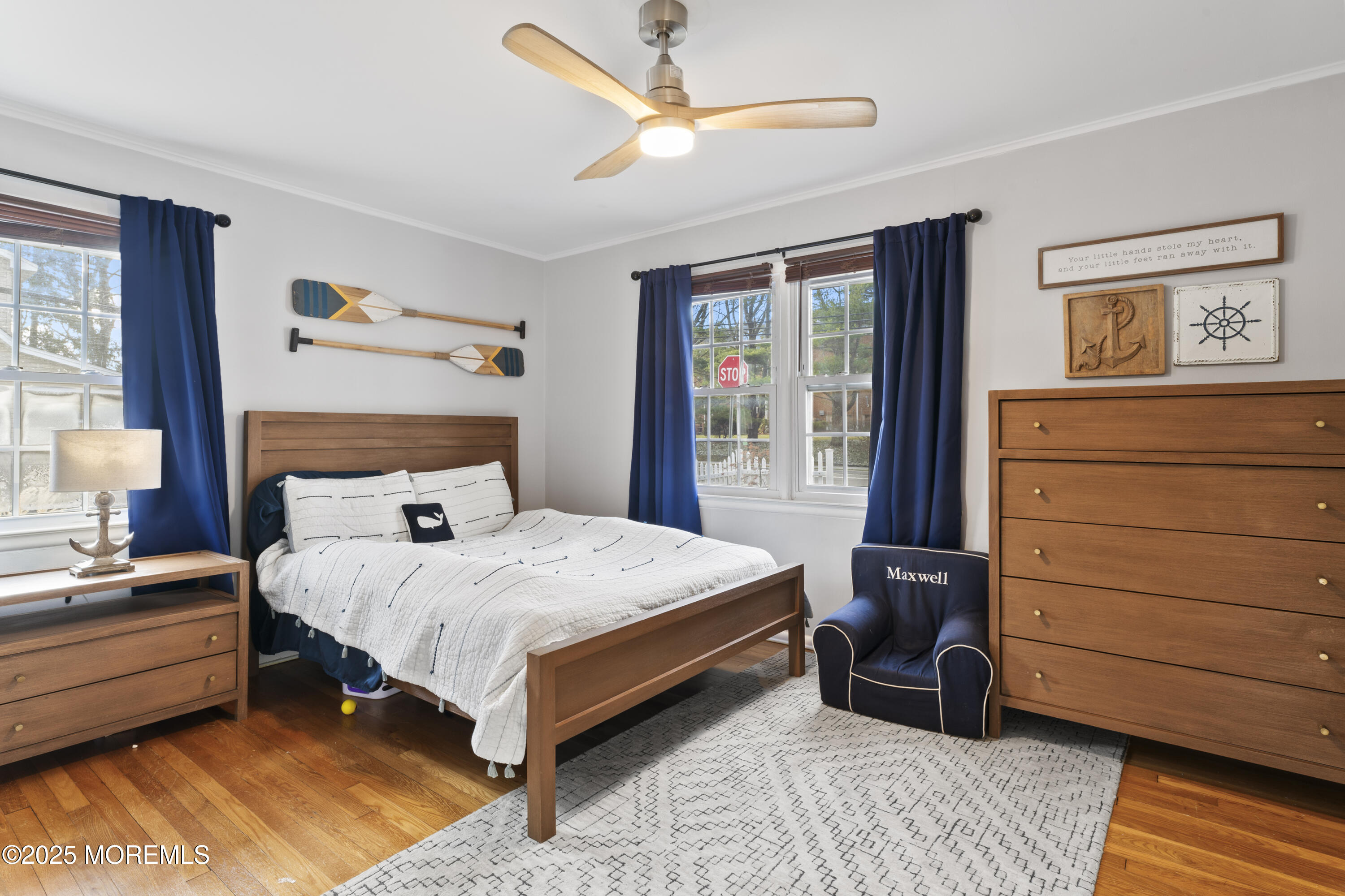 90 River Road Rumson, NJ 07760 - Photo 16 of 32 a bedroom with a bed and a dresser