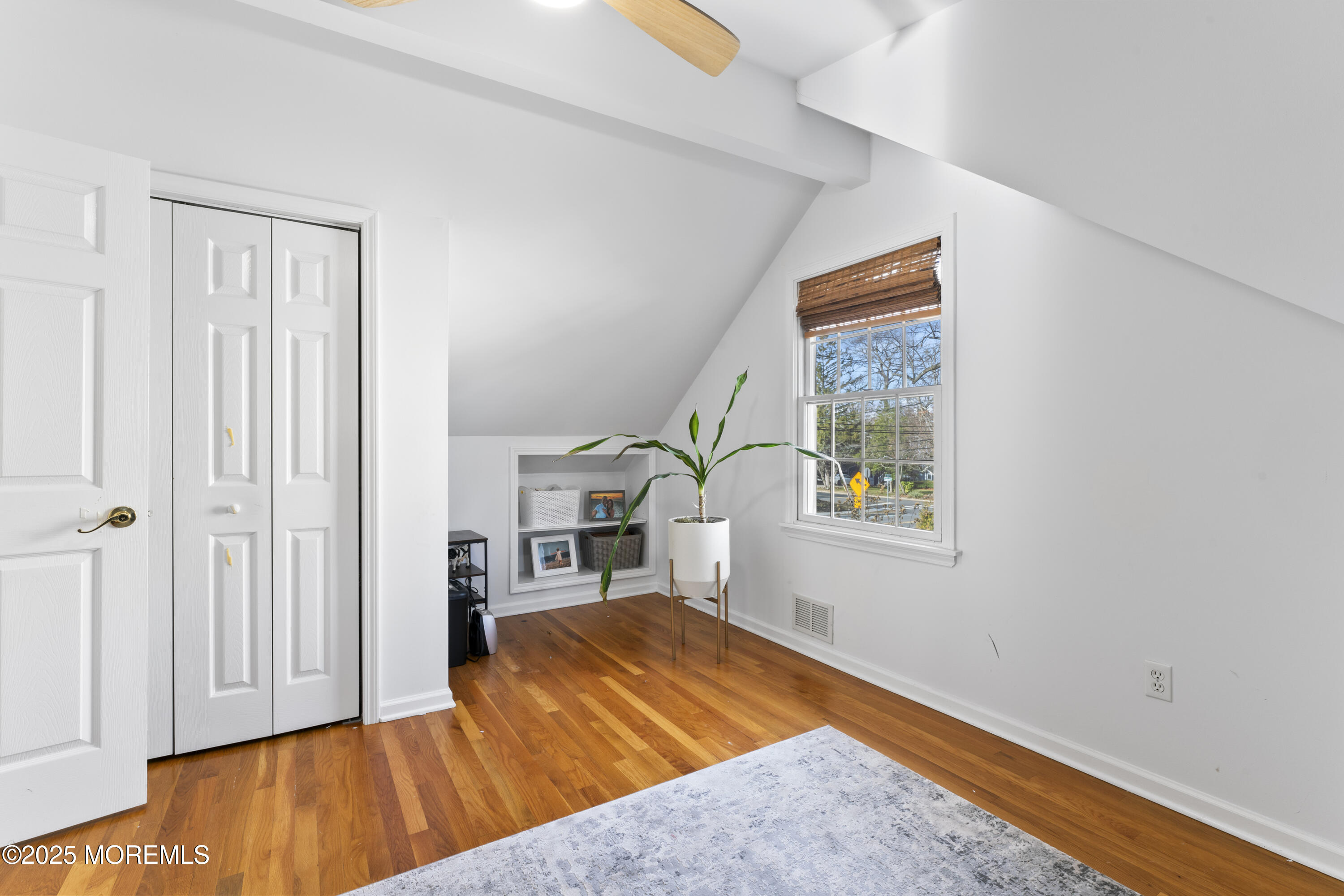 90 River Road Rumson, NJ 07760 - Photo 17 of 32 a bedroom with a bed and a window