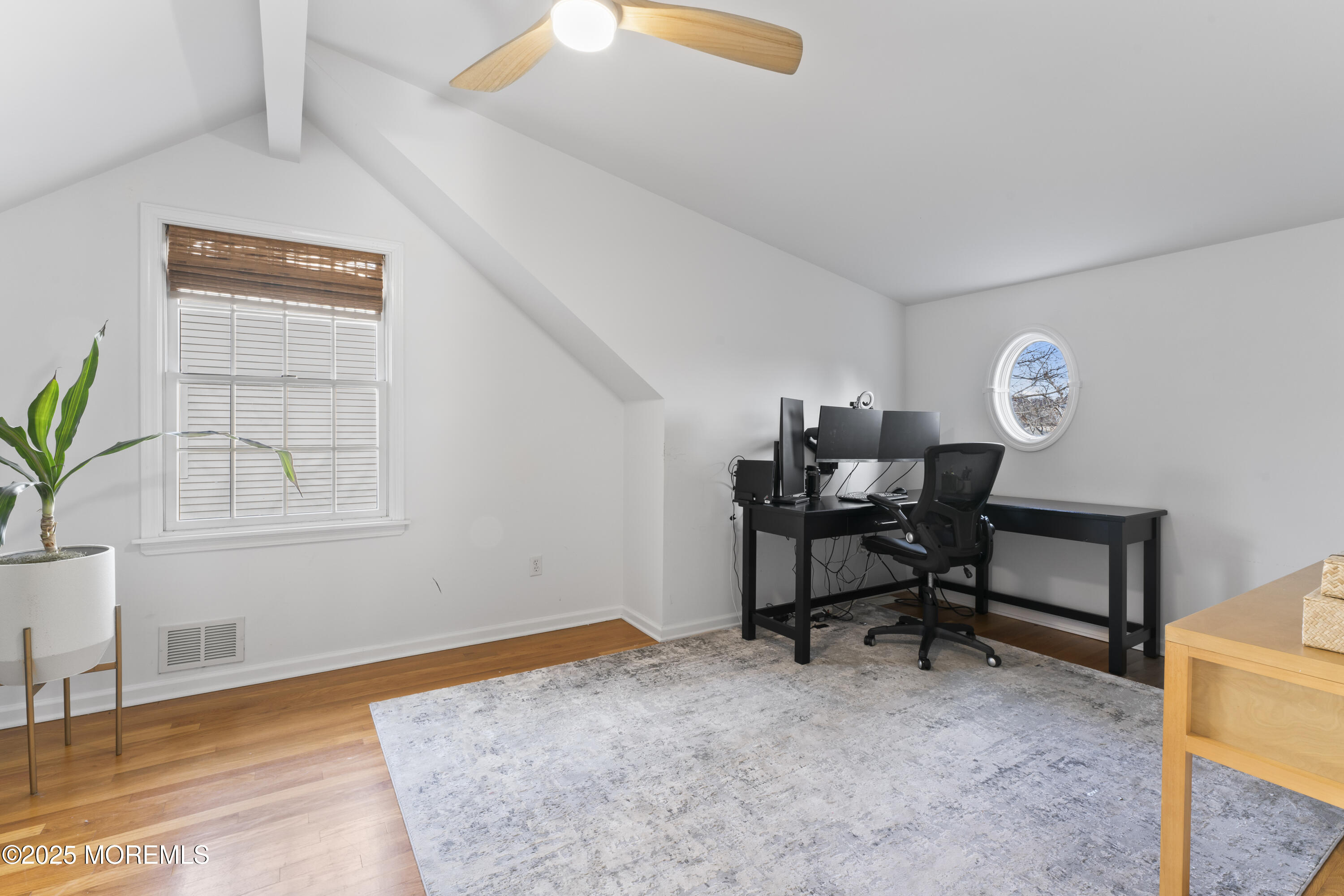 90 River Road Rumson, NJ 07760 - Photo 18 of 32 a view of a workspace with furniture and a window