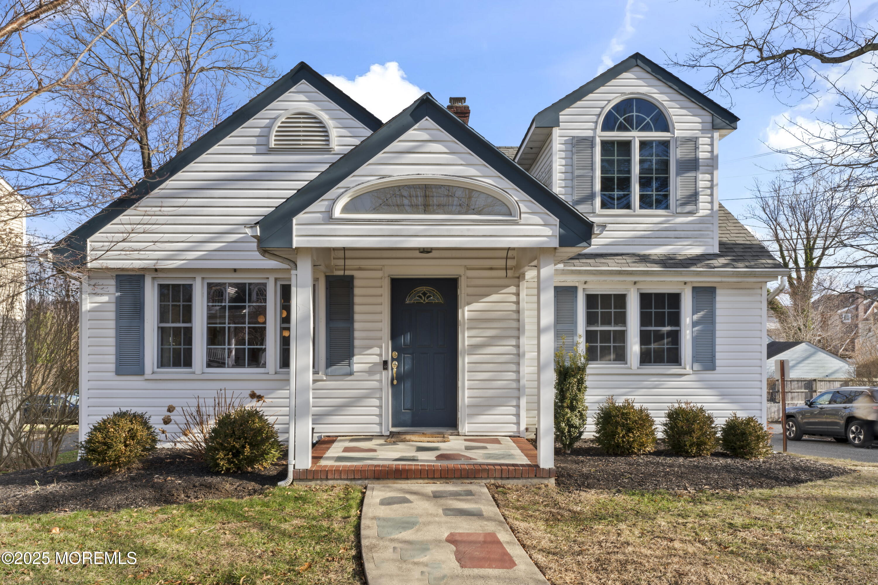 90 River Road Rumson, NJ 07760 - Photo 32 of 32 a front view of a house with garden