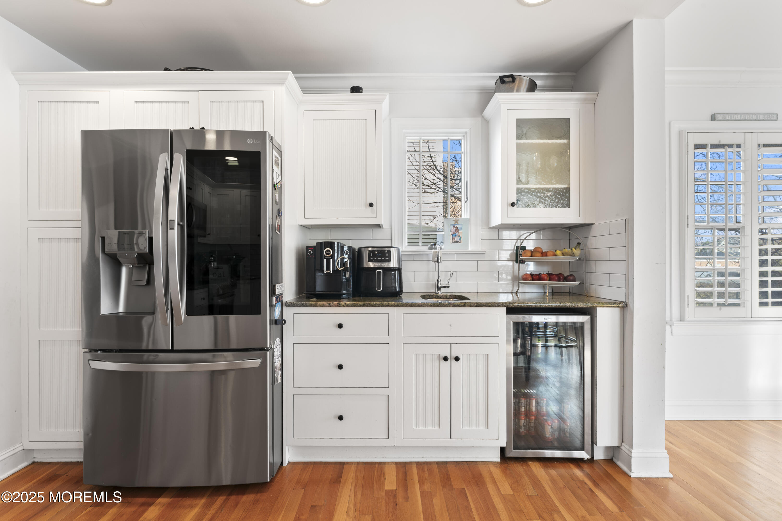 90 River Road Rumson, NJ 07760 - Photo 5 of 32 a kitchen with stainless steel appliances a refrigerator sink and cabinets