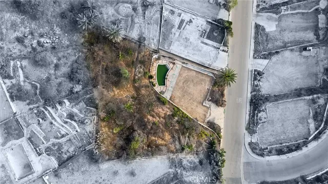 a view of a street with a building in the background