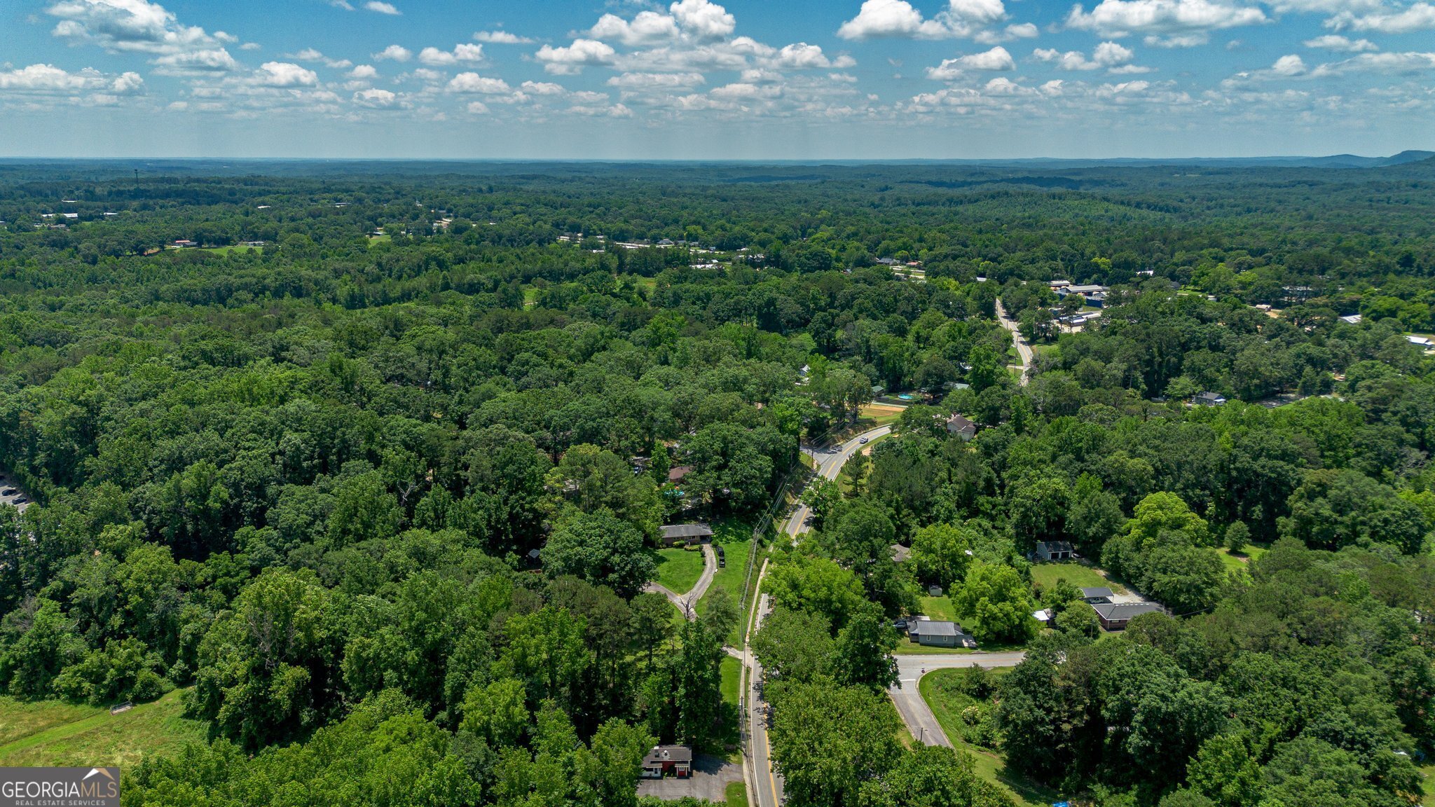 128 Branch Street Toccoa, GA 30577 - Photo 33 of 38 a view of a big yard with lots of green space and mountain view