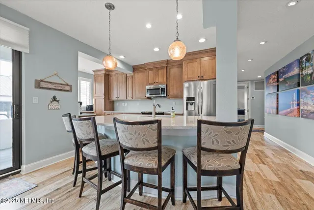 a spacious bedroom with a bed and a couch