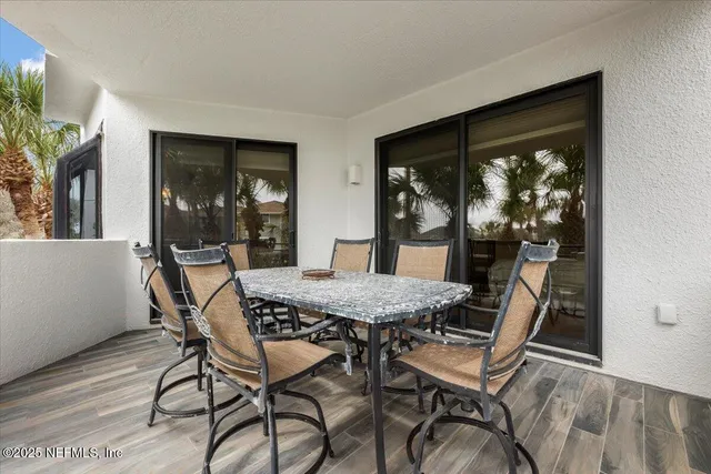 a bedroom with a bed lamp and window