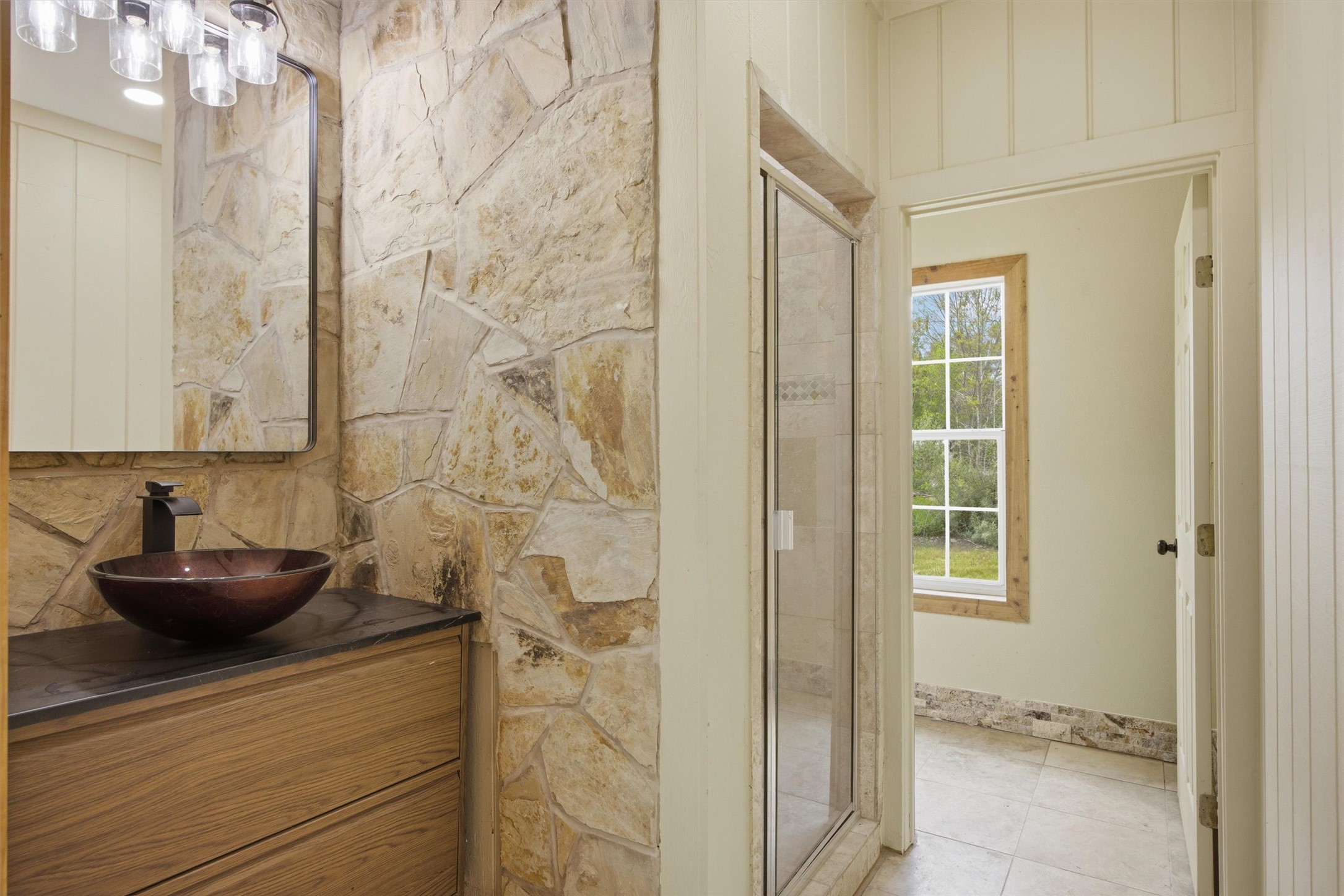 Undisclosed Address Buda, TX 78610 - Photo 15 of 19 a bathroom with a granite countertop sink a toilet and shower